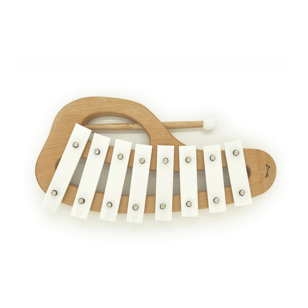 Cloud-shape beechwood toy xylophone with eight white bars and a beechwood mallet with a white head.